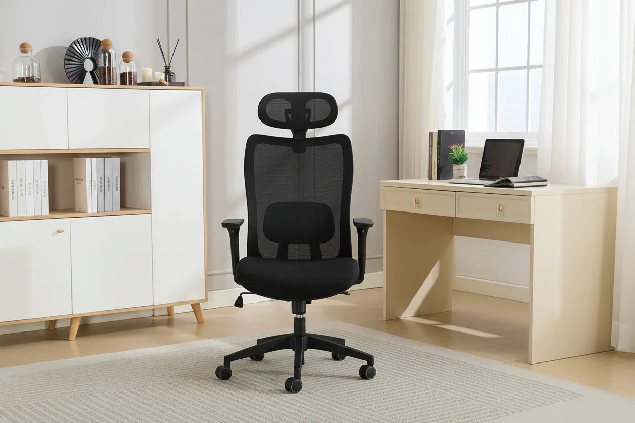 Black office chair with mesh backrest and headrest in modern home workspace