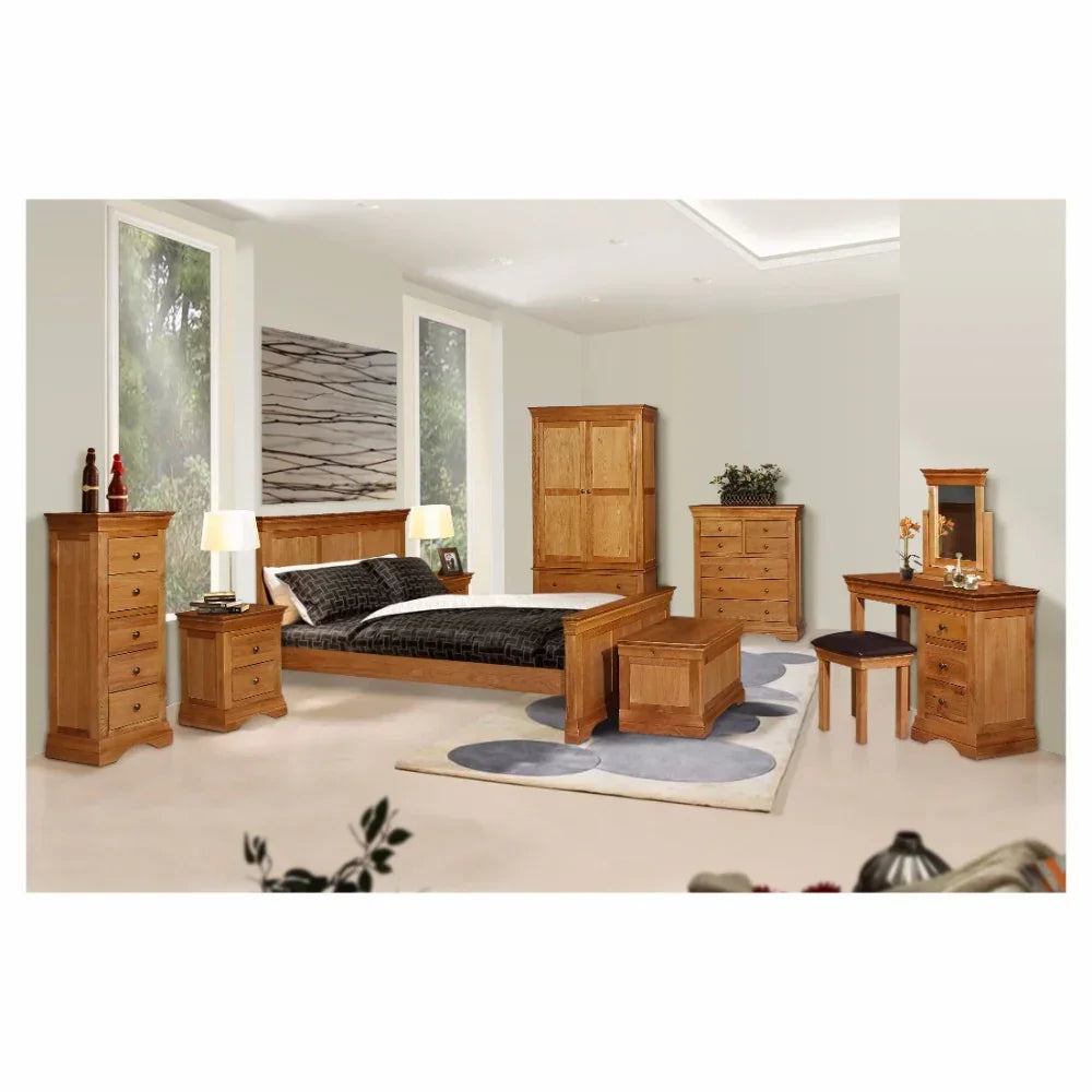 Oak bedroom furniture set with bed, wardrobe, chest of drawers, and bedside tables
