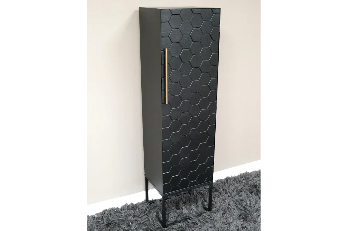 Black hexagon pattern cabinet with gold handle and metal legs on grey rug