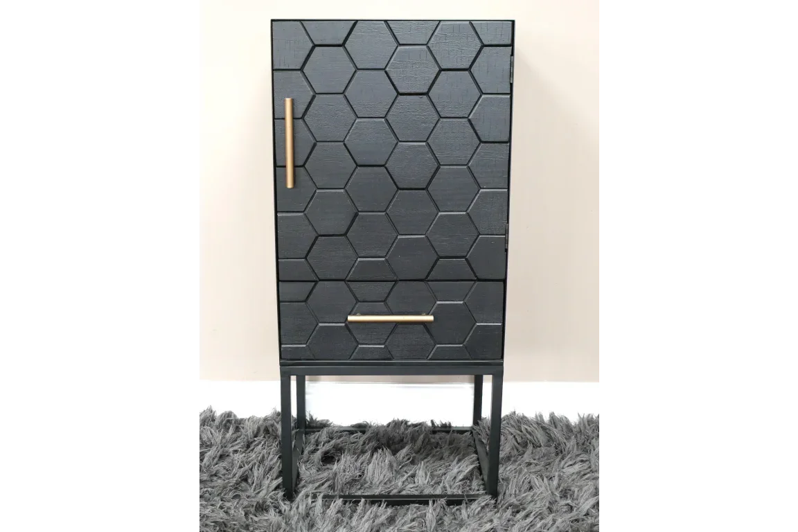 Black hexagon pattern cabinet with gold handles and metal legs on grey rug