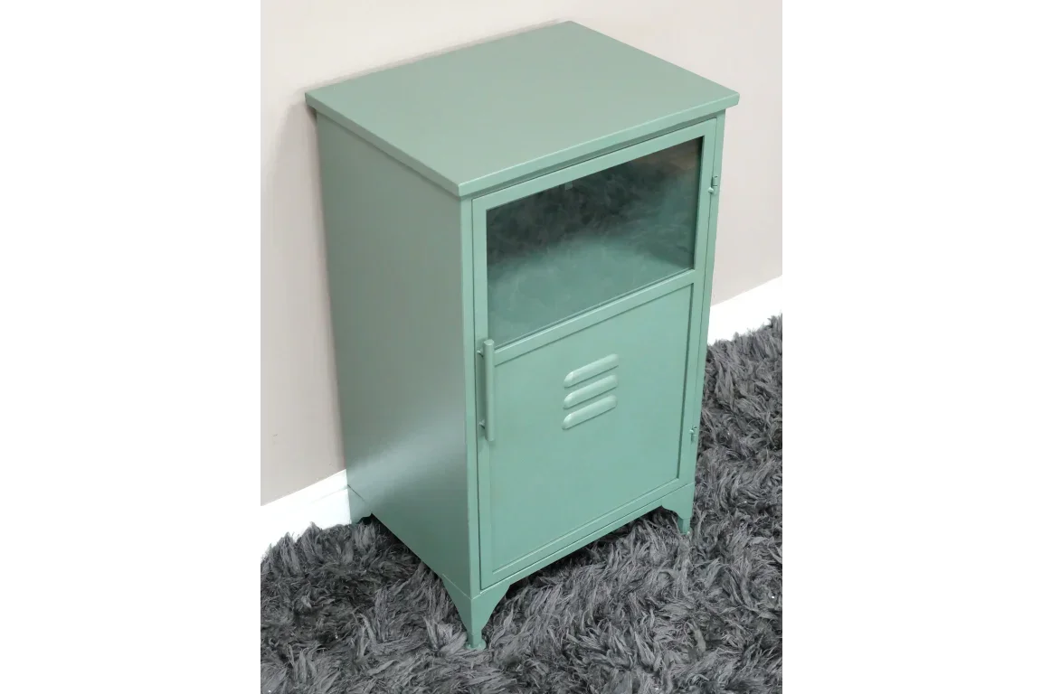 Green metal bedside cabinet with glass door and lower storage panel on grey rug