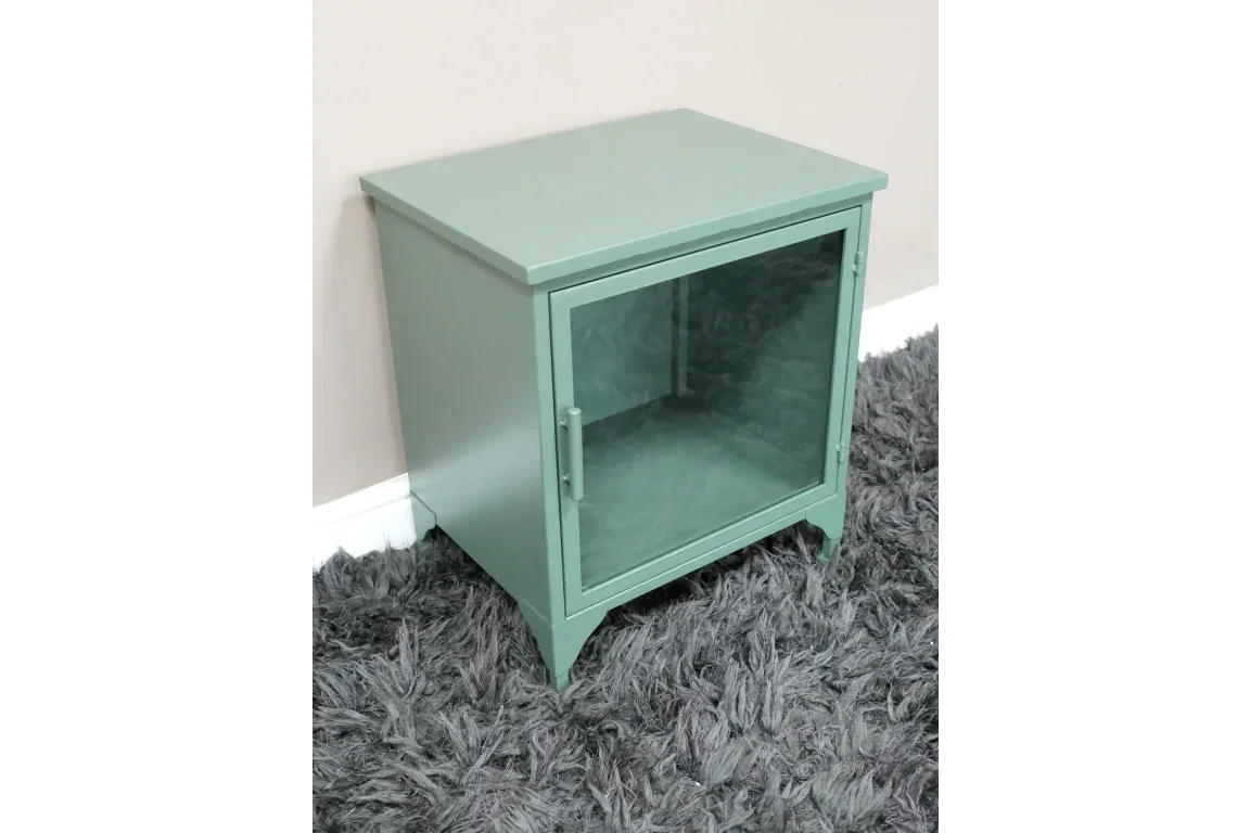Green bedside cabinet with glass door on grey shaggy rug, modern style furniture