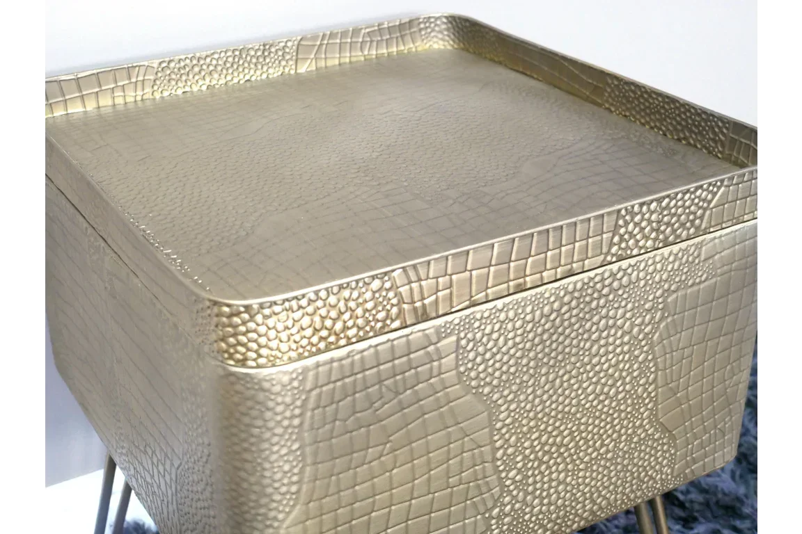 Textured gold metal side table with square top and raised edge