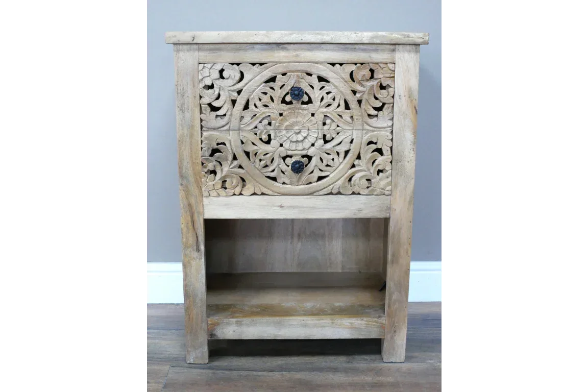 Carved wood bedside table with floral design drawer front and open shelf