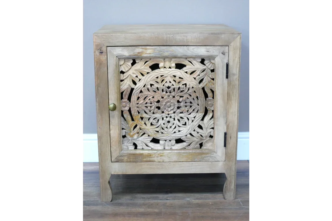 Rustic wooden bedside cabinet with floral carved door in natural finish