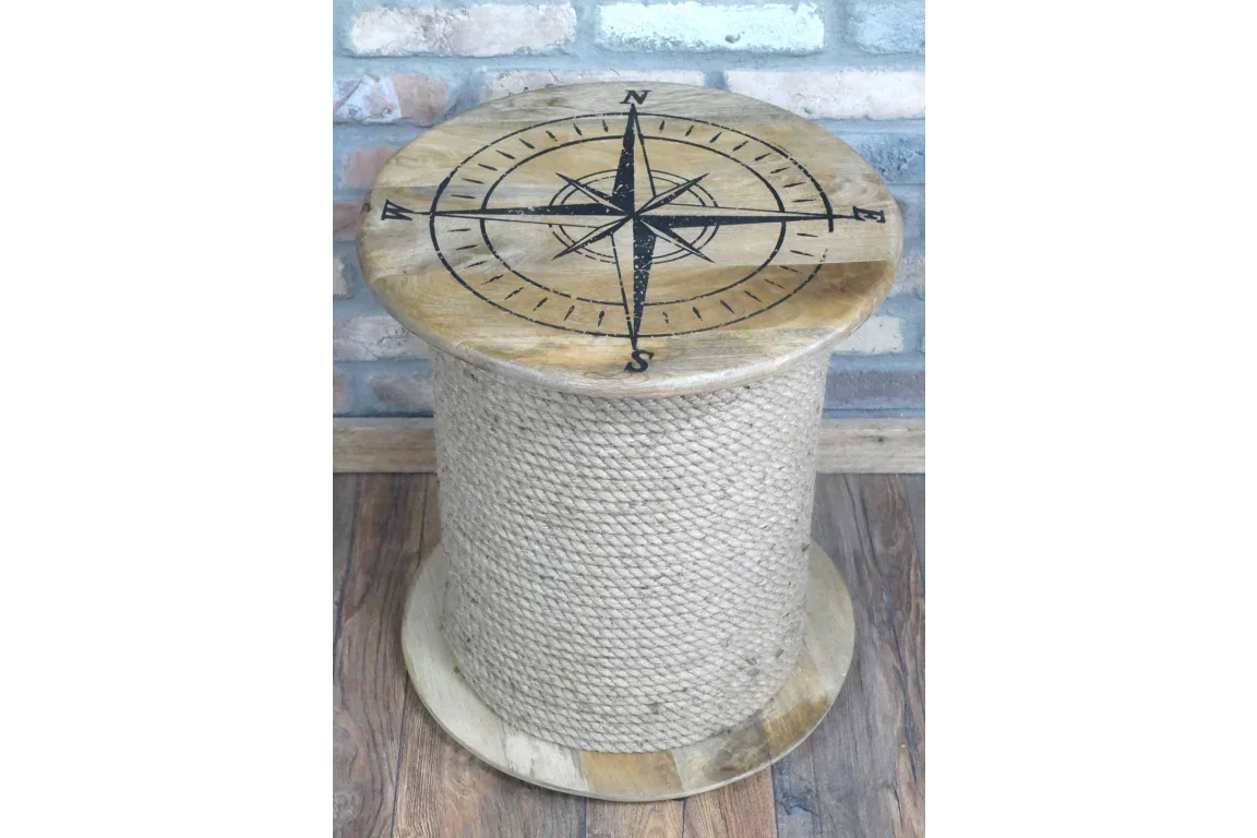 Wooden side table with rope wrap and compass design top on wooden floor