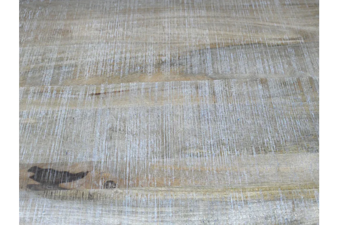 Rustic wooden tabletop surface with light distressed finish and visible wood grain lines