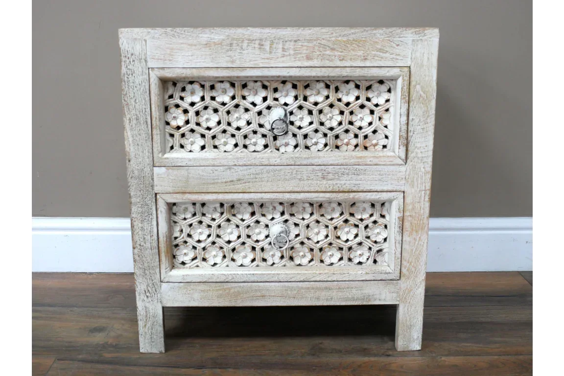 Rustic wooden bedside table with two drawers and floral carved panels