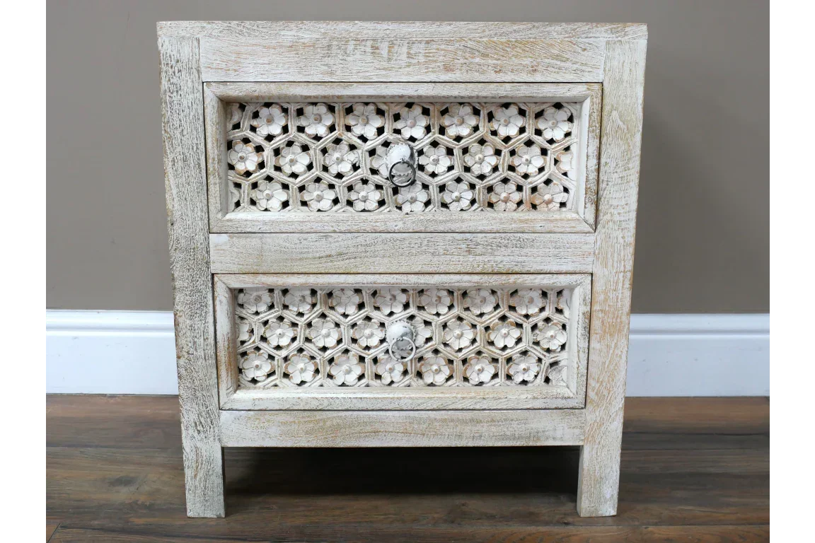 Wooden bedside table with two floral carved drawers and distressed white finish
