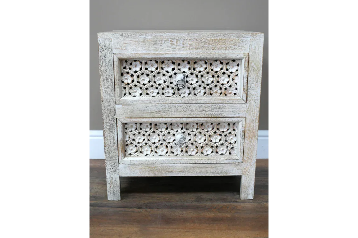 Rustic wooden bedside table with two carved drawers and whitewashed finish