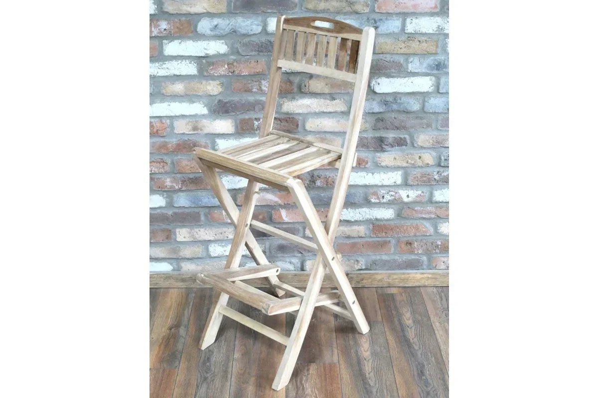 Wooden folding bar stool with slatted seat and backrest on wood floor