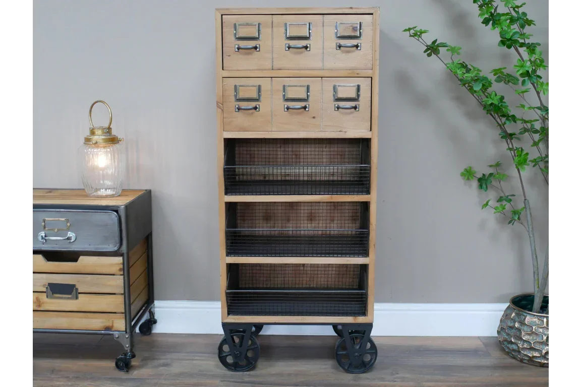Industrial storage unit with wood drawers, black mesh shelves, and metal wheels