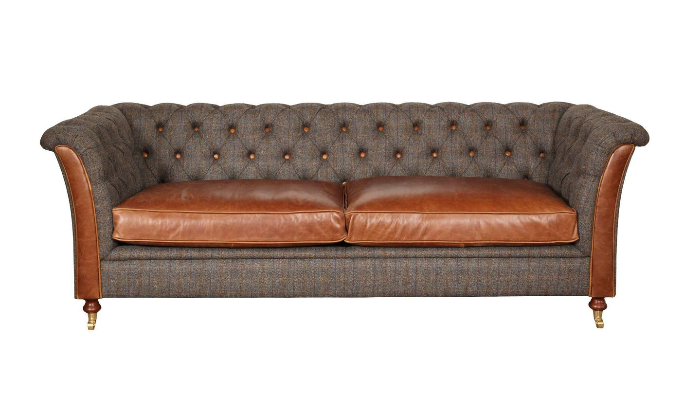 Brown leather and tweed sofa with deep buttoned backrest and wooden legs, front view