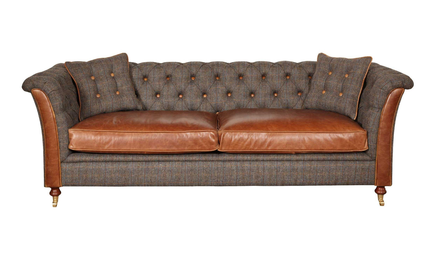 Brown leather and tweed sofa with button tufted back and two matching cushions