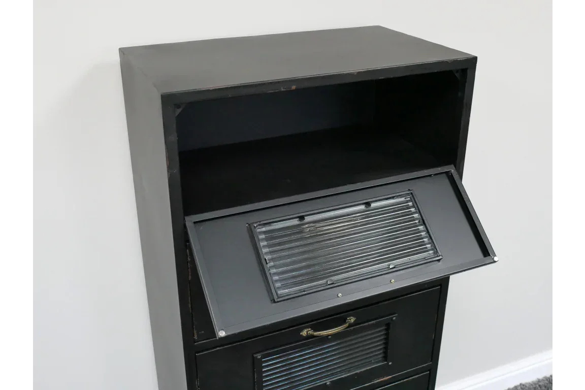 Black metal storage cabinet with open shelf and pull-down door featuring ribbed glass panel