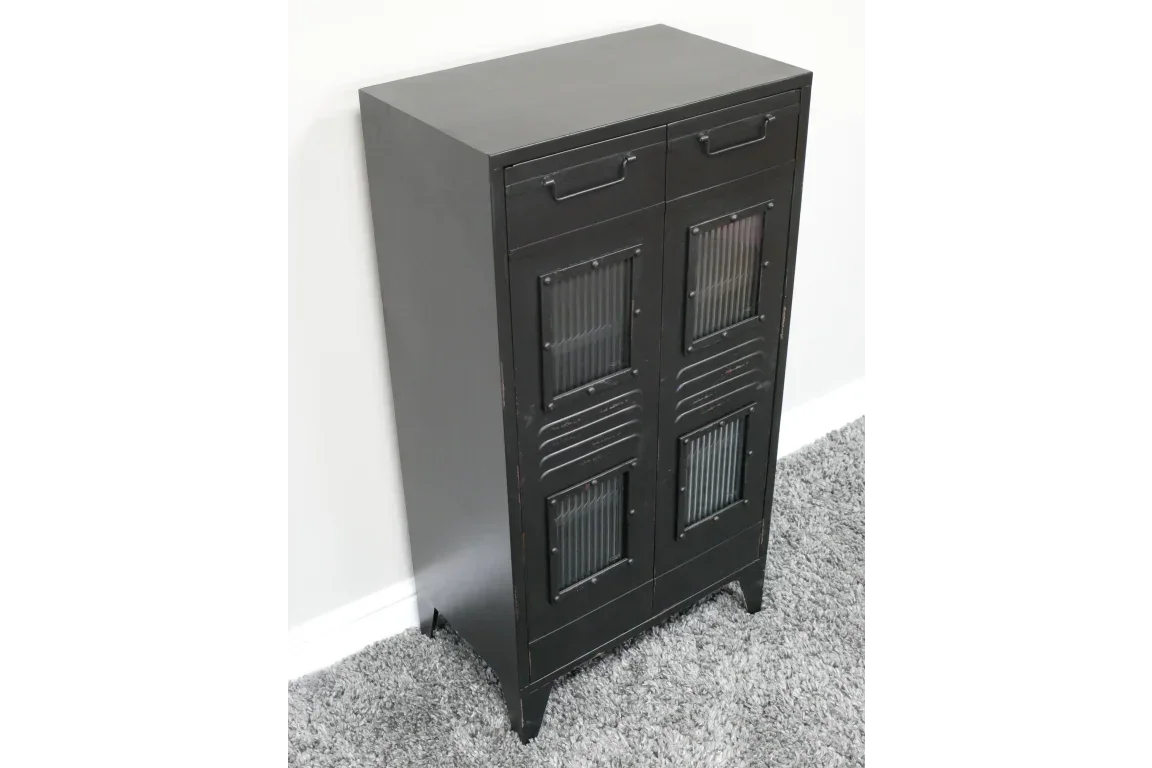 Black metal cabinet with ribbed glass doors and two drawers on grey carpet