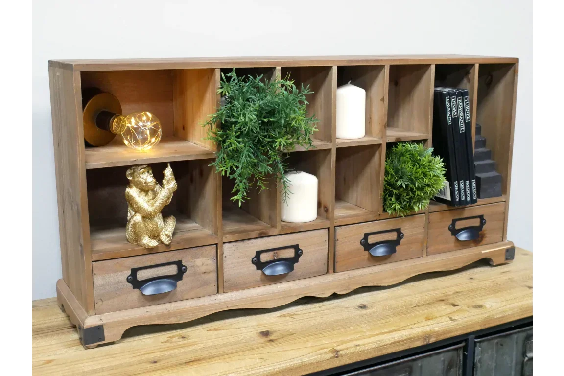 Wooden storage organiser with drawers, cubby shelves holding books, plants, candles, ornaments
