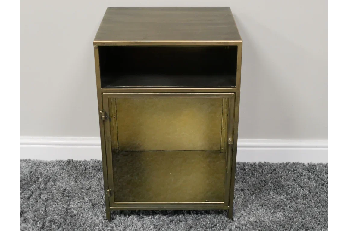 Metal bedside cabinet with open shelf and single door on grey carpet