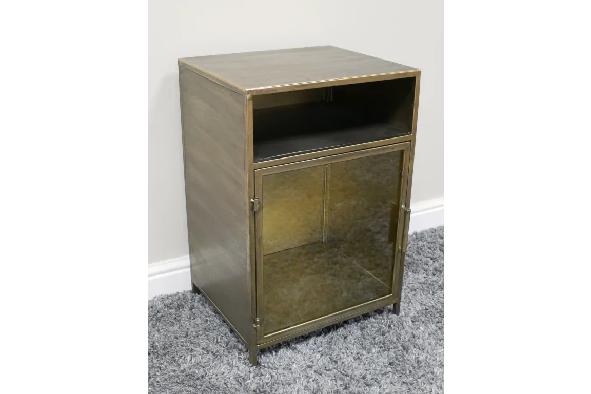 Metal bedside cabinet with glass door and open shelf on grey carpet