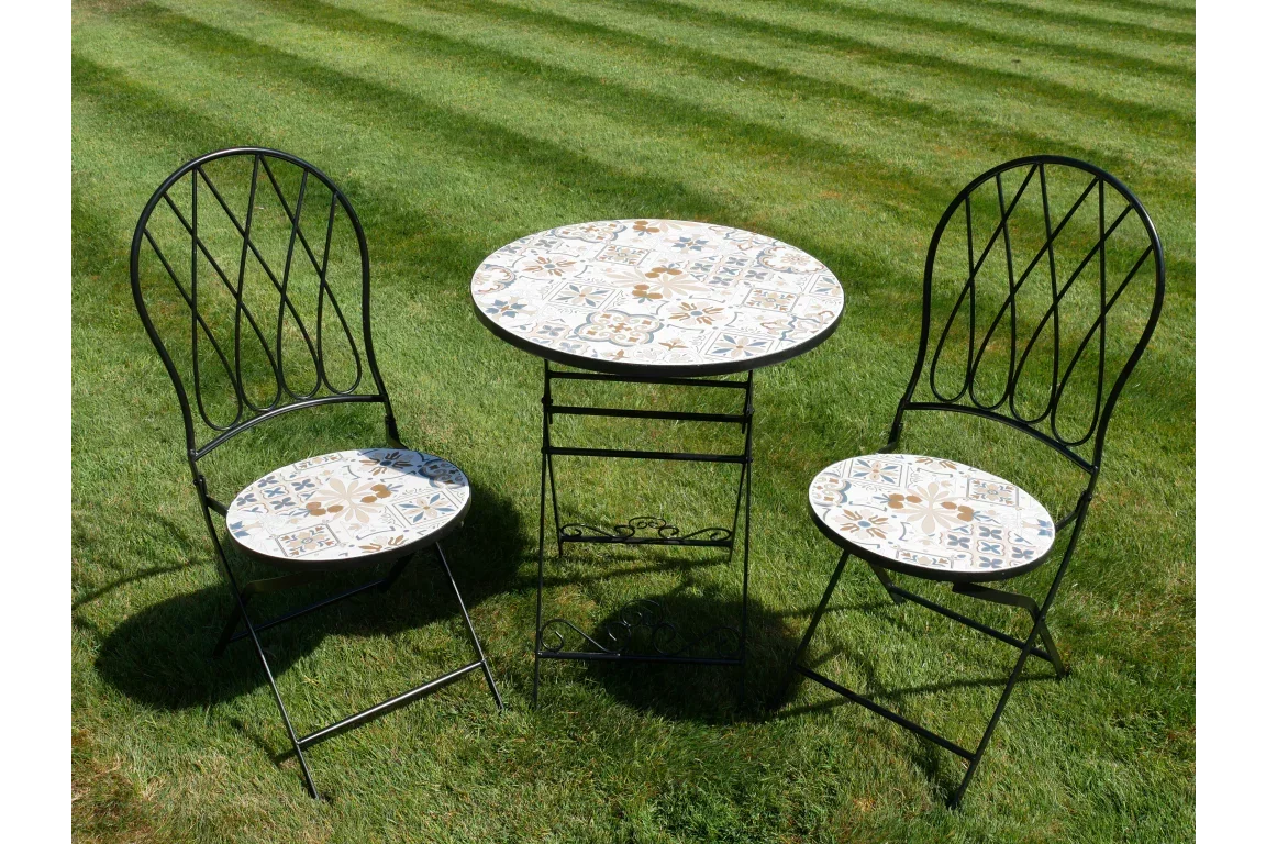 Mosaic garden bistro set with round table and two chairs on grass