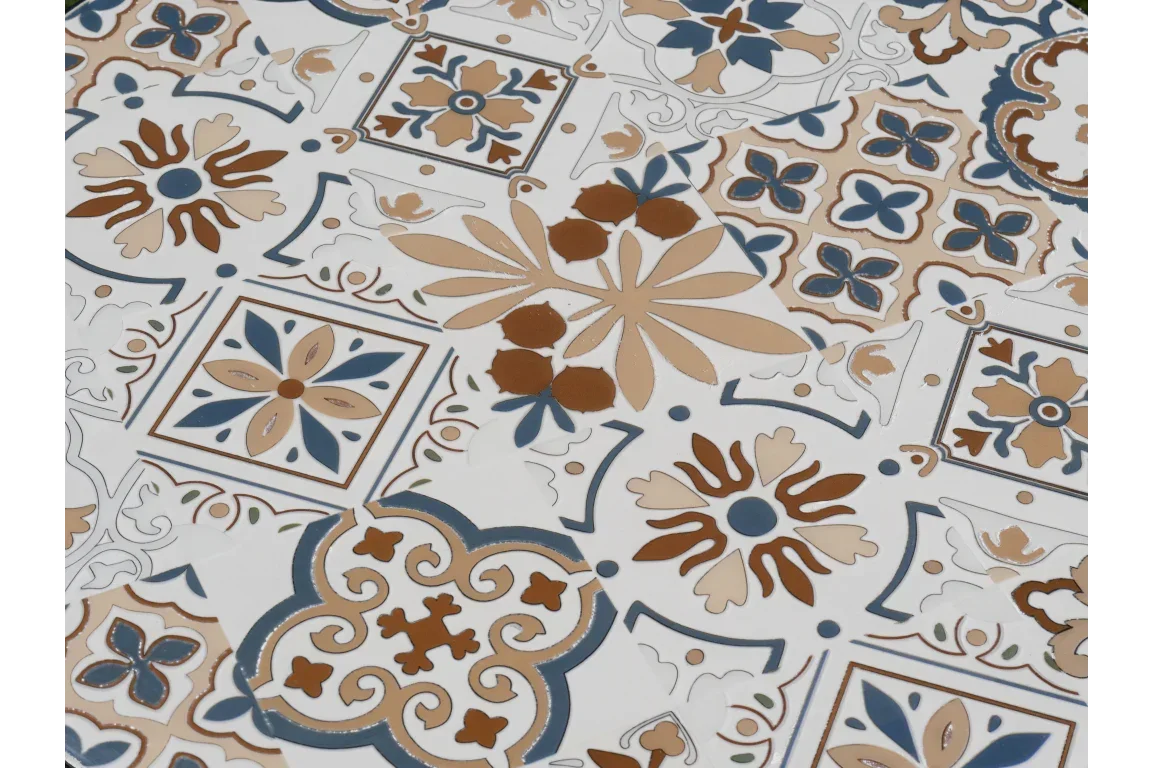 ceramic tile with blue and brown floral geometric pattern, close-up view of textured surface