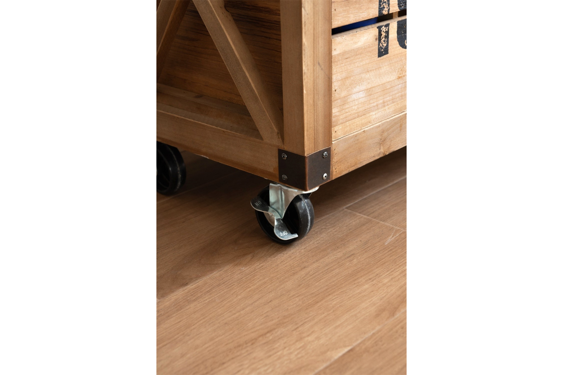 Close-up angled view of the light brown wooden wine cabinet corner with black caster wheel on wooden floor.
