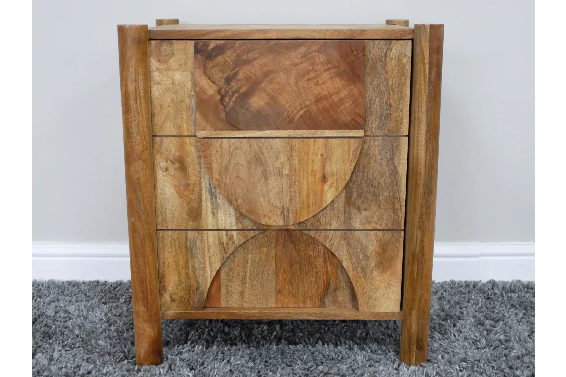 Solid wood bedside table with three drawers and geometric carved front