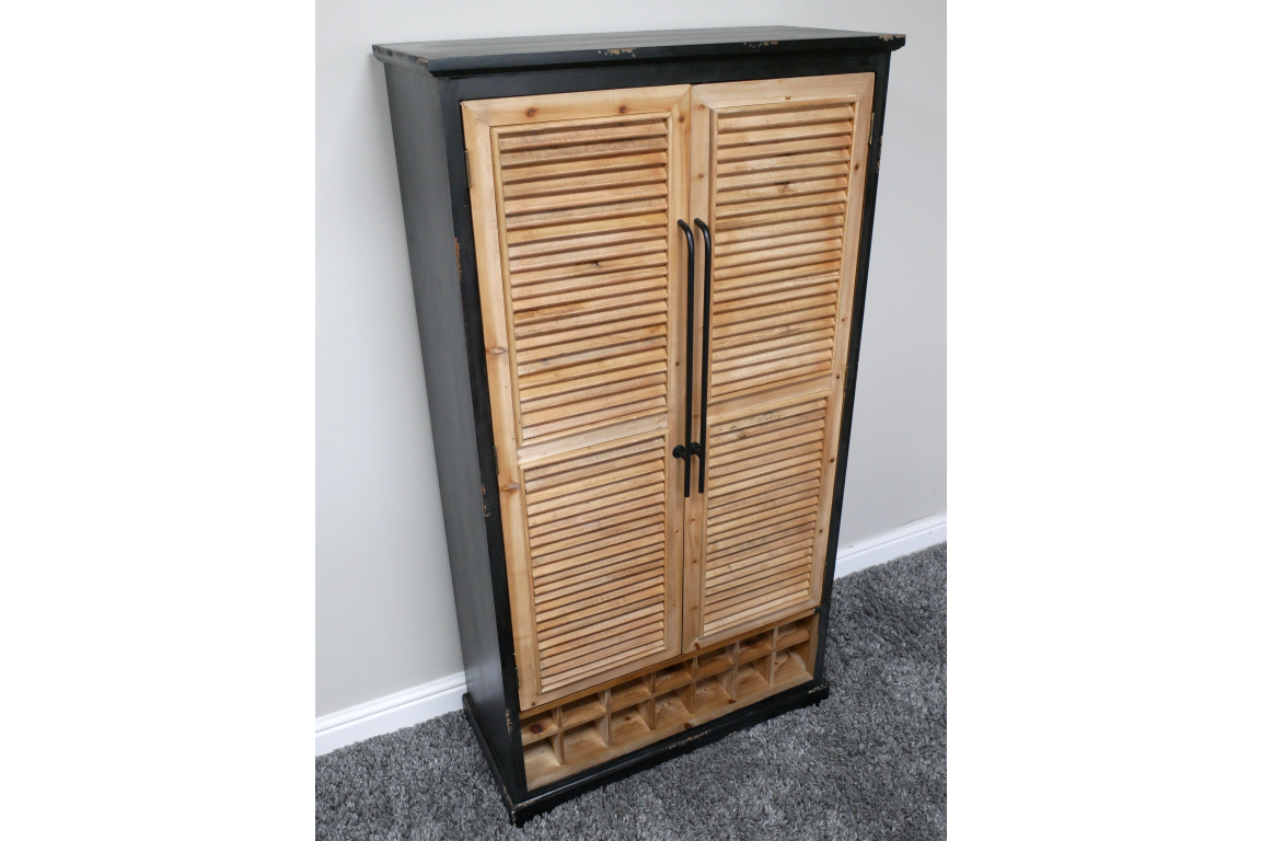 Tall shutter bar cabinet with natural wood louvered doors, black frame, metal handles, and built-in wine rack, angled view.