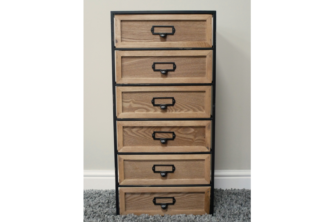 Tall industrial drawer cabinet with six wooden drawers framed by black metal, shown front view on gray carpet.