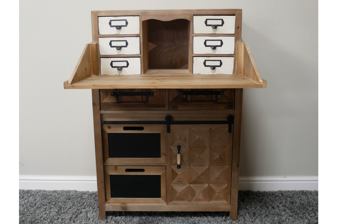 Rustic wooden cabinet with six white drawers on top, two chalkboard panels, and a geometric wooden door below, front view.