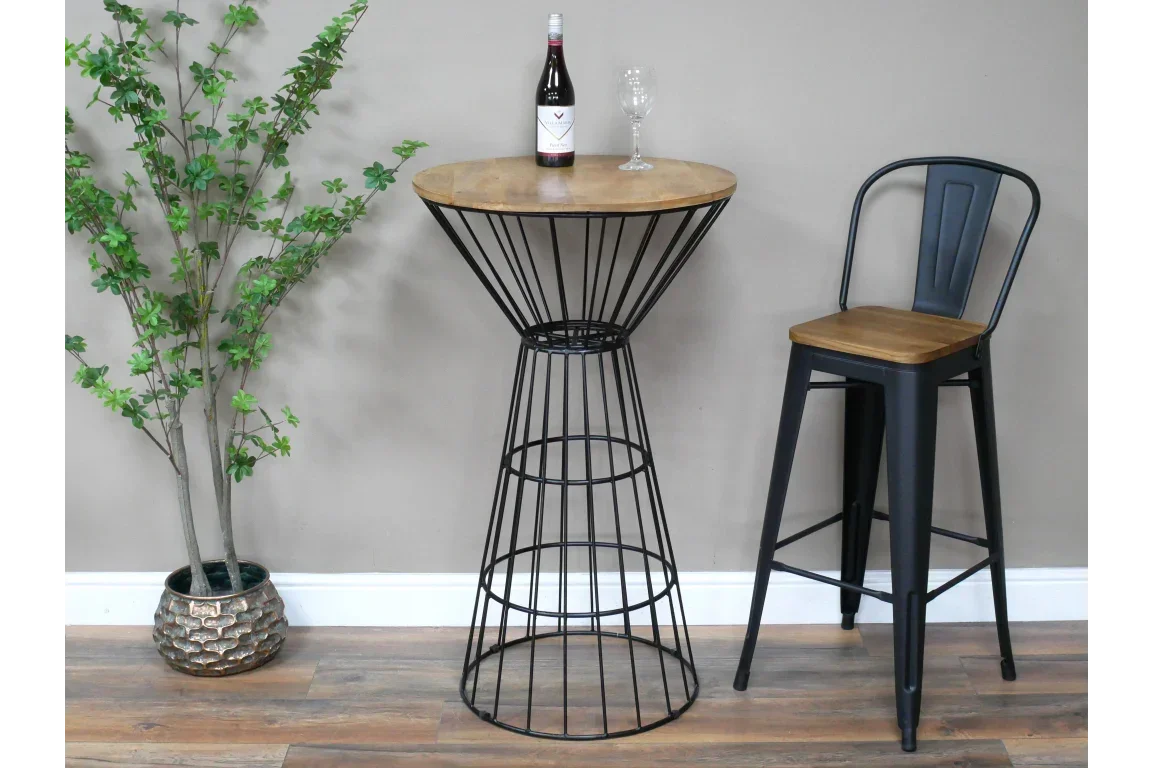 Industrial bar table with wire metal base and wood top, paired with matching bar stool