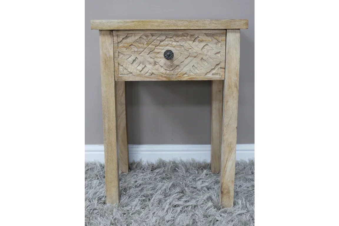 Natural wood bedside table with carved drawer front and single metal knob