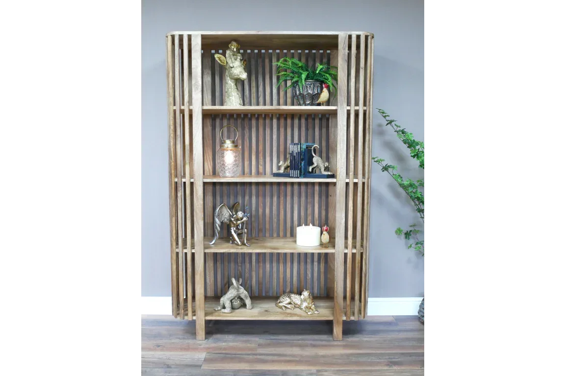 Tall wooden shelving unit with slatted sides, displayed with ornaments and decor items