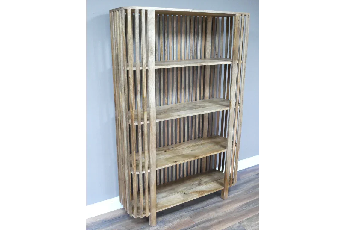 Tall wooden bookcase with open slatted sides and four shelves on hardwood floor