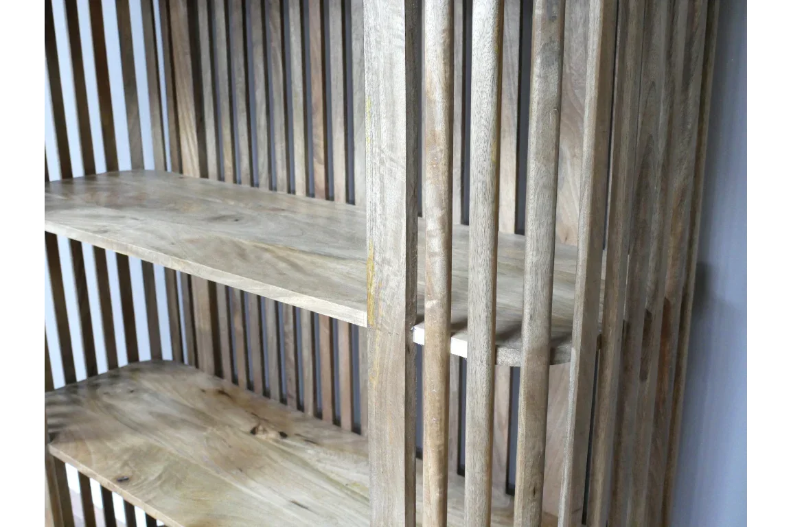 Natural wood shelving unit with vertical slat sides and two shelves, close-up view