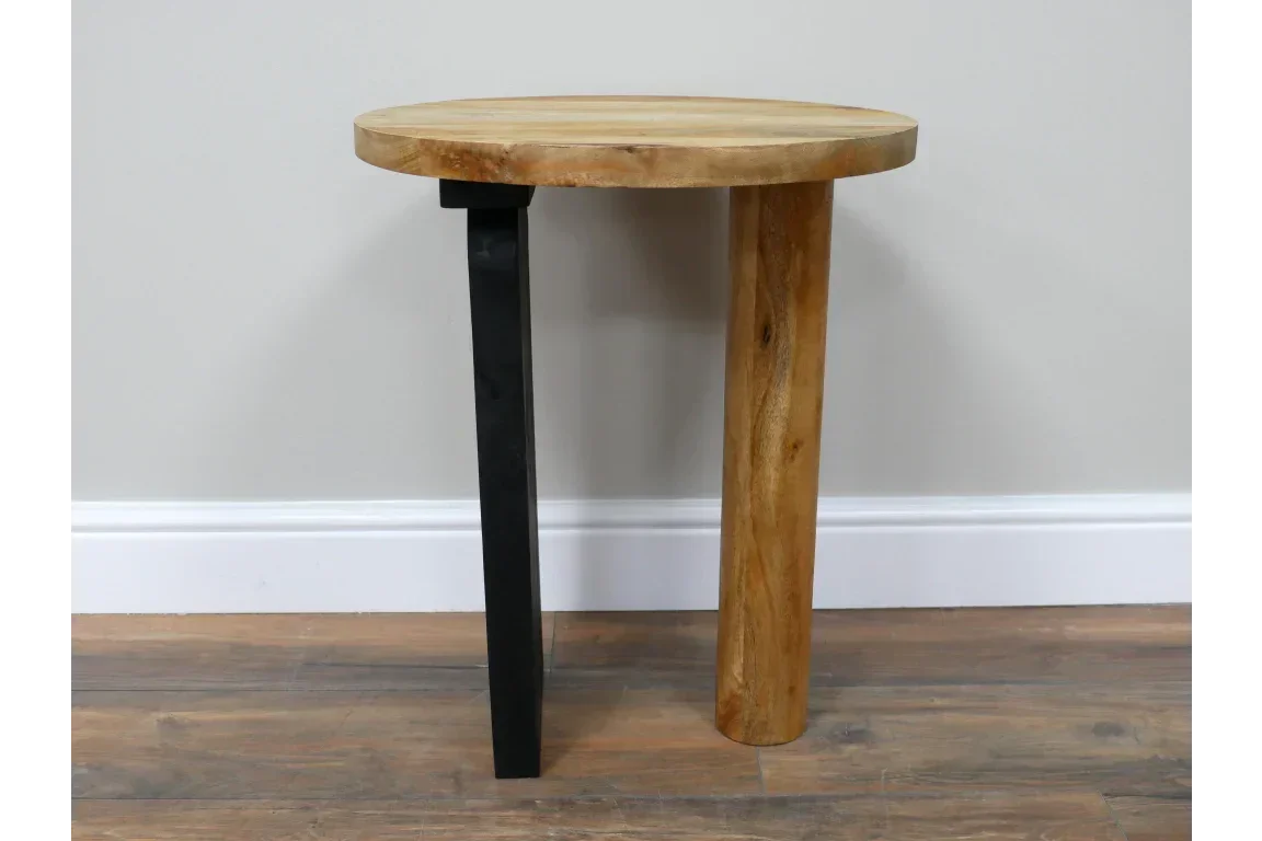Round wooden side table with natural top, contrasting wooden and black metal legs