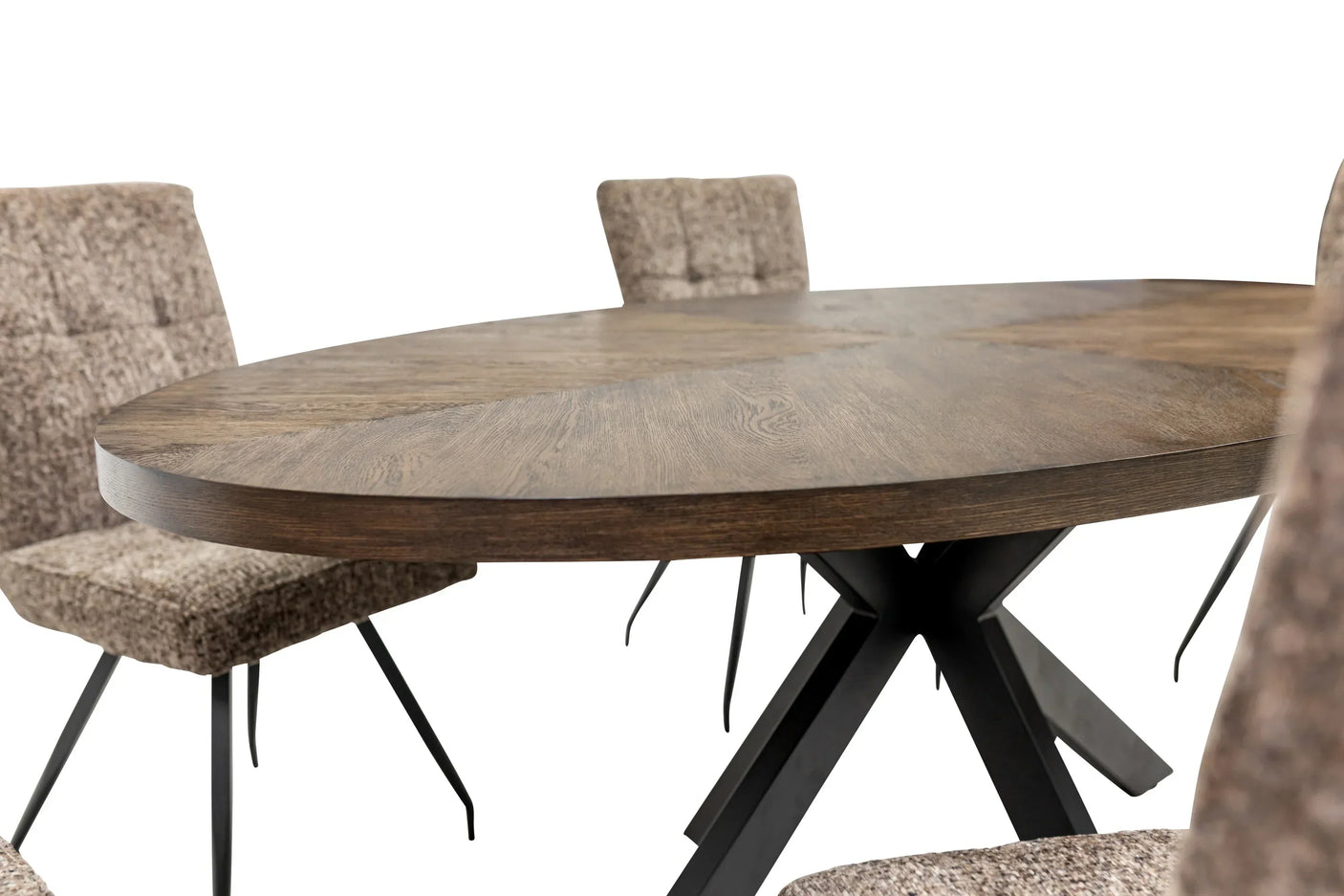 Round wooden dining table with black metal legs and four fabric chairs
