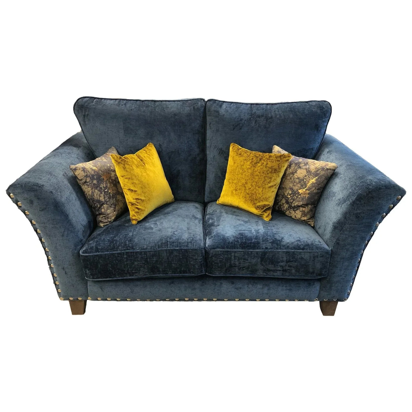 Dark blue velvet sofa with studded arms and four yellow and patterned accent cushions
