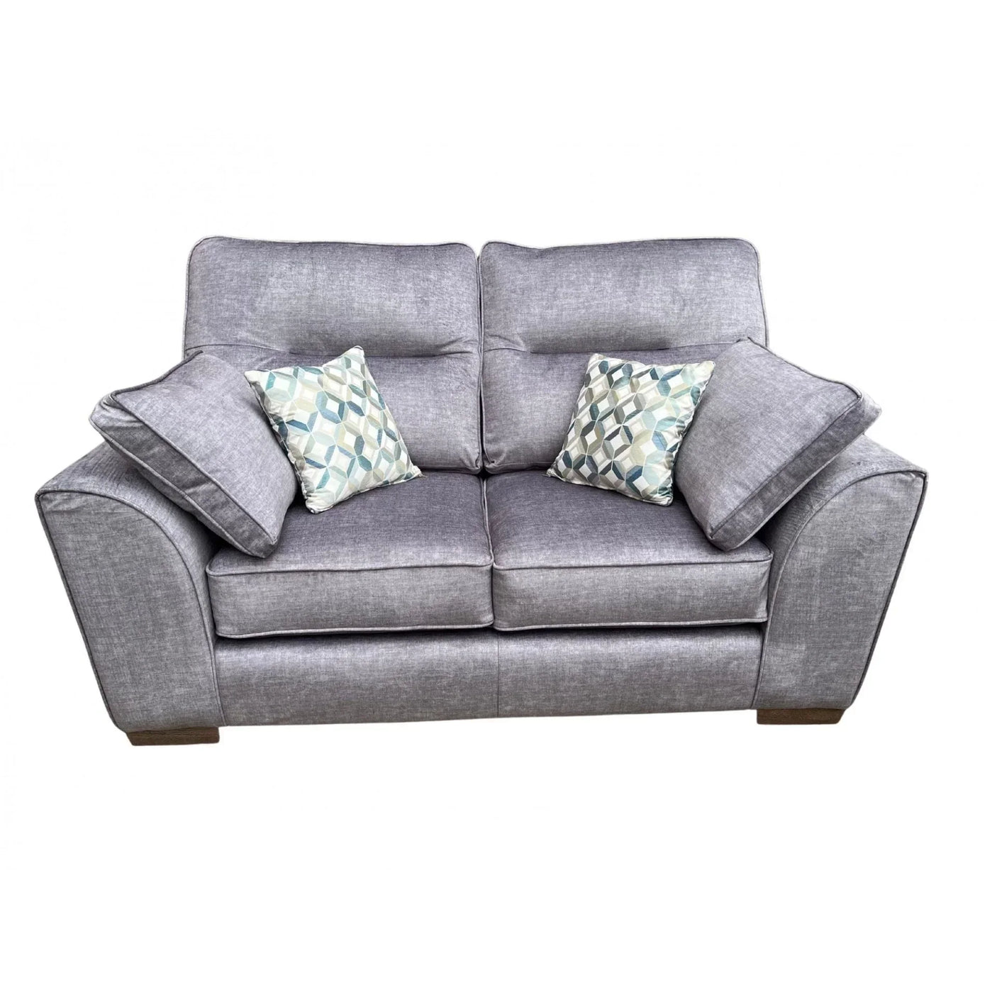 Grey fabric sofa with scatter back cushions and patterned throw pillows