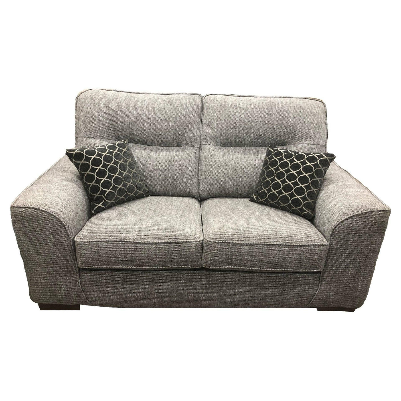 Grey fabric sofa with two black patterned scatter cushions, front view