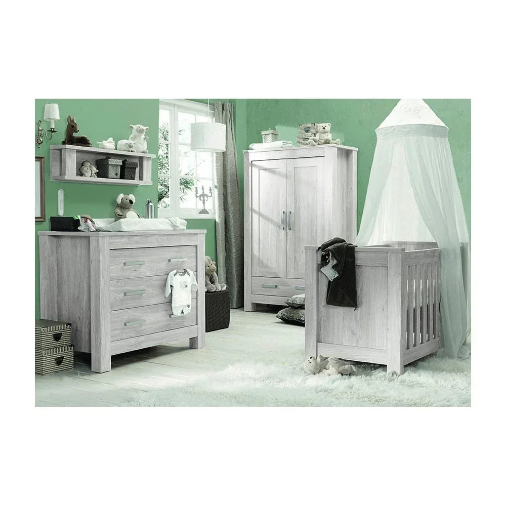 Light wood nursery furniture set with cot bed, wardrobe, drawers and wall shelf
