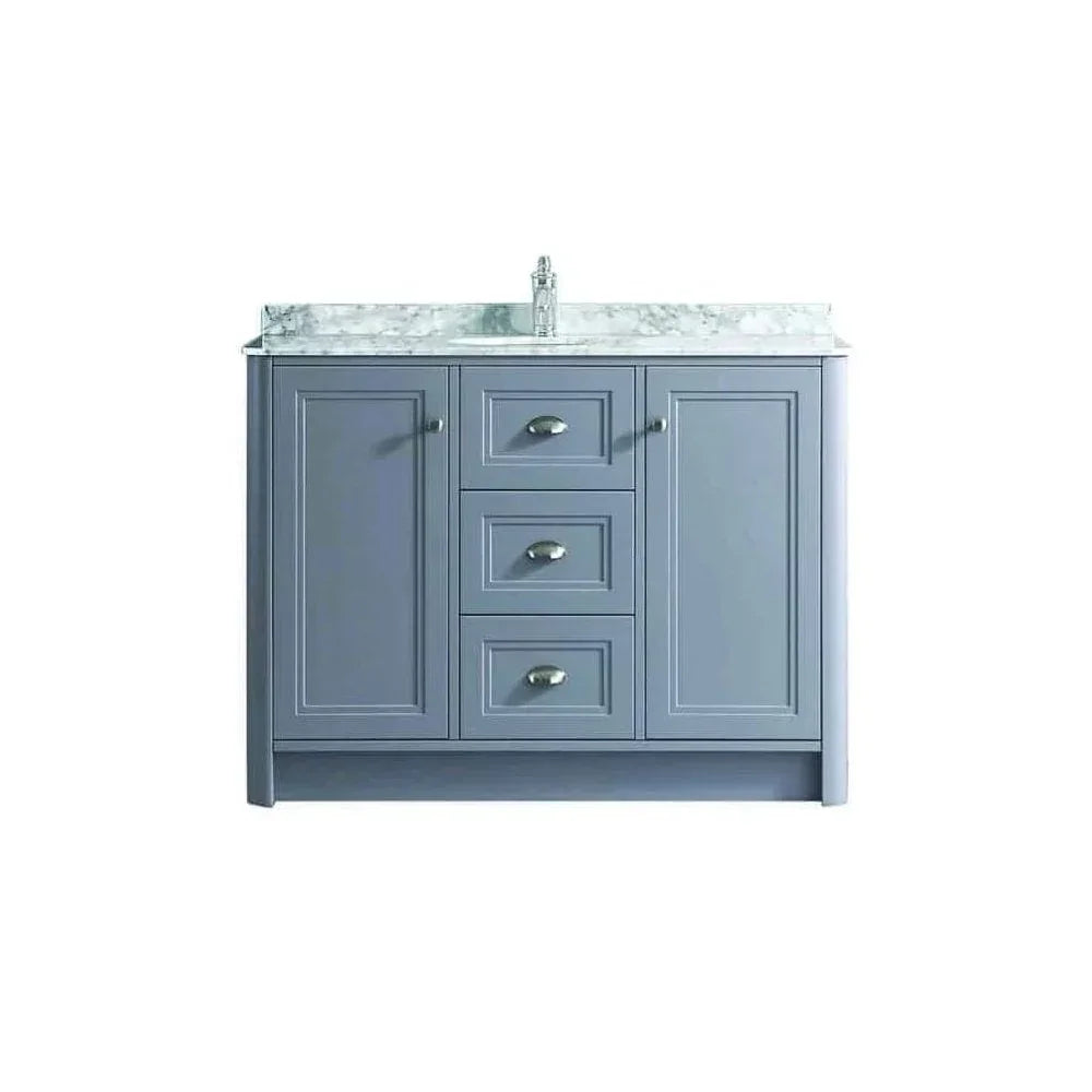 Grey bathroom vanity unit with marble countertop, three drawers and brushed metal handles