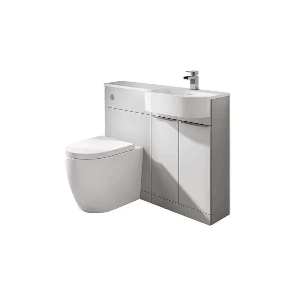 White bathroom furniture unit with integrated toilet and basin, chrome tap, and storage cabinet
