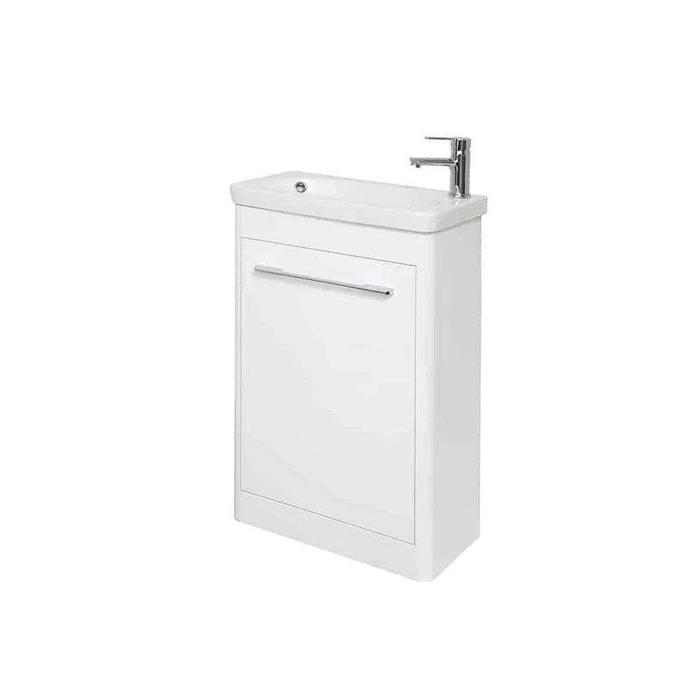 White bathroom vanity unit with integrated sink and chrome tap, single door, front view