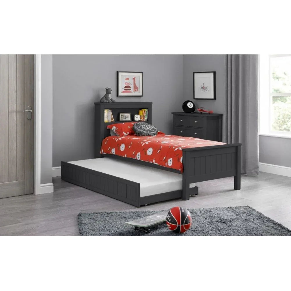 Grey wooden kids bed with integrated bookshelf and pull-out trundle in modern bedroom