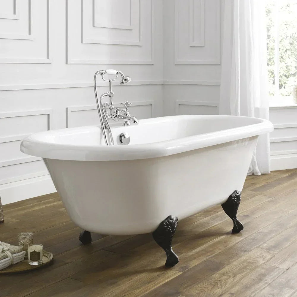 White freestanding clawfoot bath with chrome tap in classic panelled bathroom