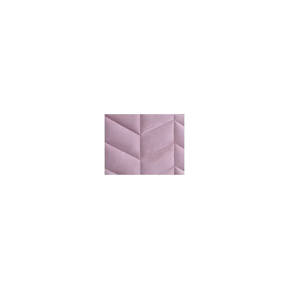 Closeup of pink velvet upholstery with geometric stitched pattern for furniture
