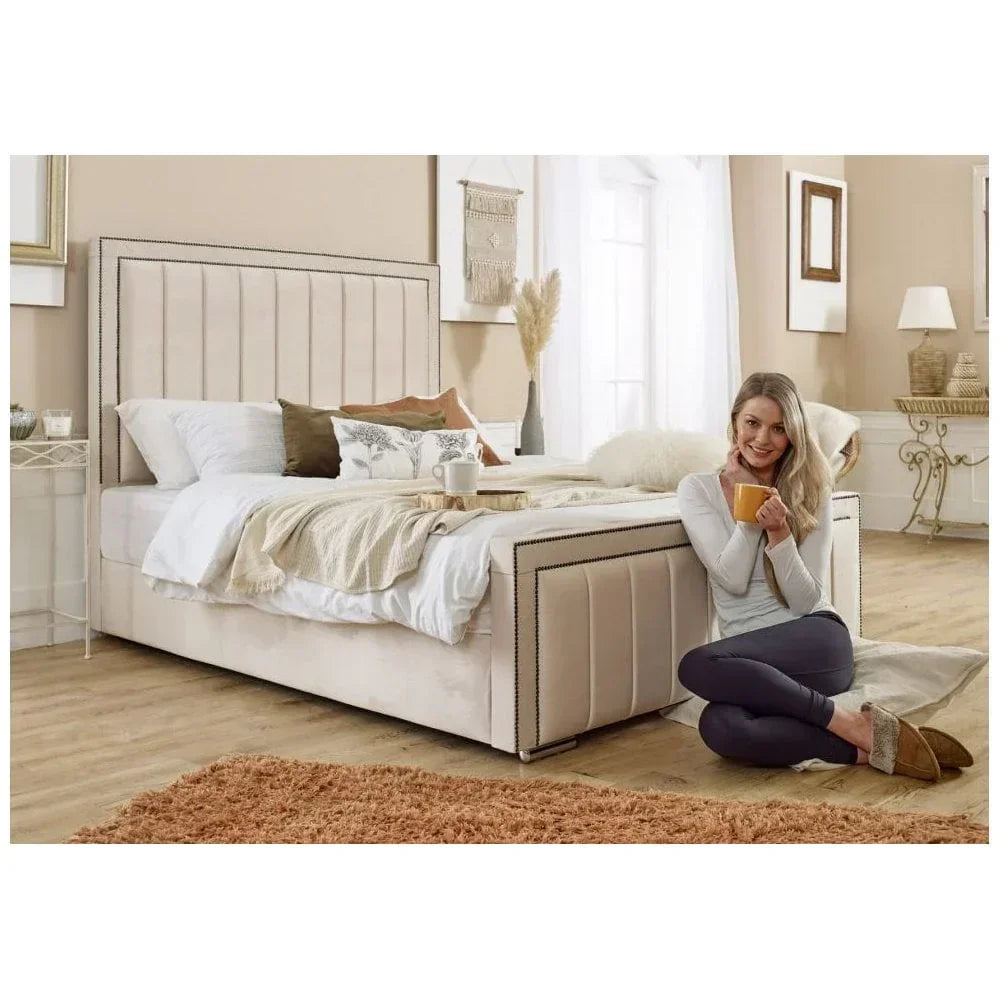 Beige upholstered storage bed with vertical panel headboard in cozy bedroom setting
