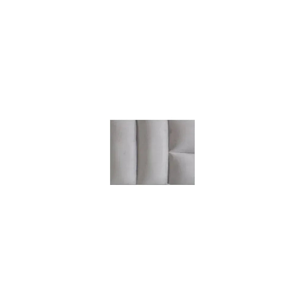 Close view of grey fabric sofa upholstery with vertical panel stitching