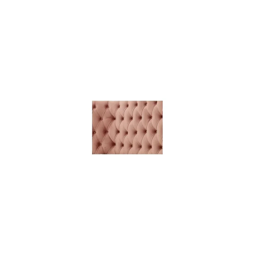 Blush pink velvet bed headboard with deep button tufting detail